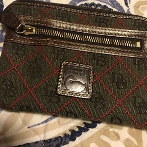 Dooney and bourke. Wallet.  I’ve never used this  but had it in a drawer
